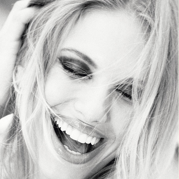 limited fine art photography - laughing woman in black and white