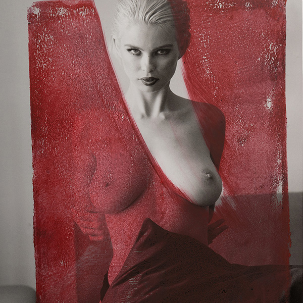 "Ice Queen" – black-and-white portrait with red acrylic overpainting, direct gaze, white-blonde hair – contemporary collage art